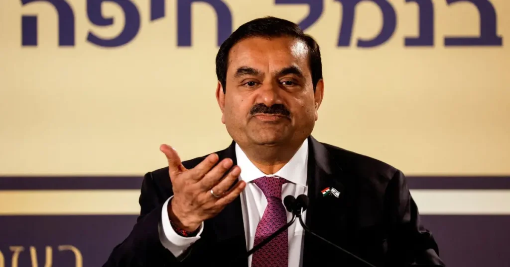 Gautam Adani speaking at an event, a key figure in the Adani bribery case and the Hindenburg allegations.